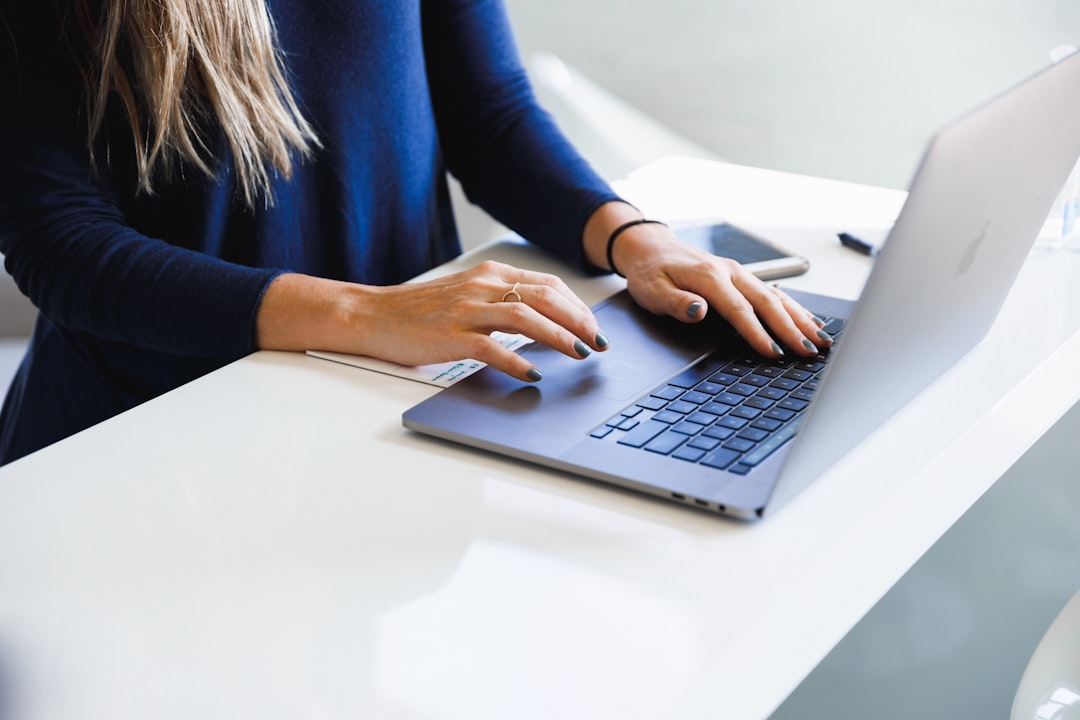 A foreign professional secures a co-working desk in a modern Shibuya shared office space